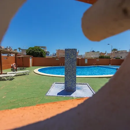 Sunny 3-bedroom House With Pool And Rooftop Terrace Holiday home Torrevieja